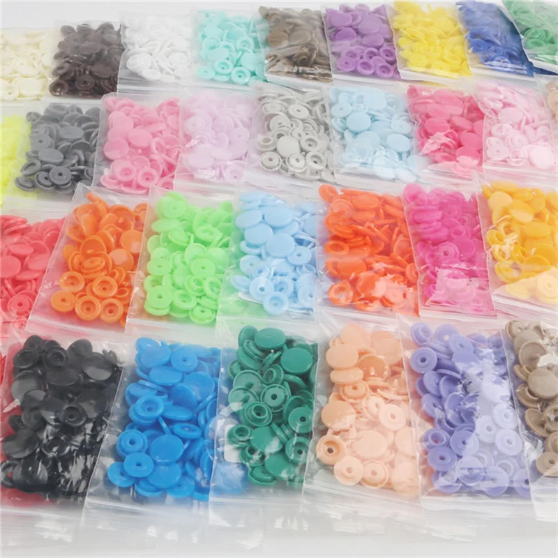 Boutons à pression en plastiqu - Baby Clothing Used avis et prix