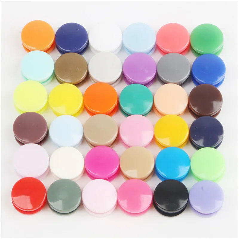 Boutons à pression en plastiqu - Baby Clothing Used avis et prix